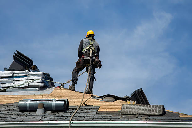 Professional Gutter Installation technician working in Laguna Beach, FL